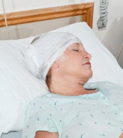 Woman in hospital bed